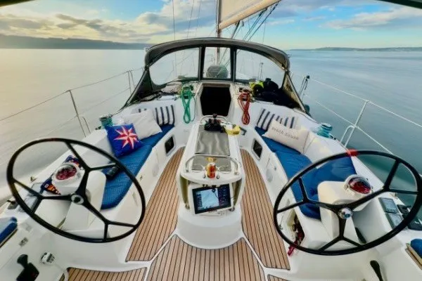 Slide: The Image of Luxurious 2006 Jeanneau Sun Odyssey 45 sailboat cockpit with dual steering wheels. - 6