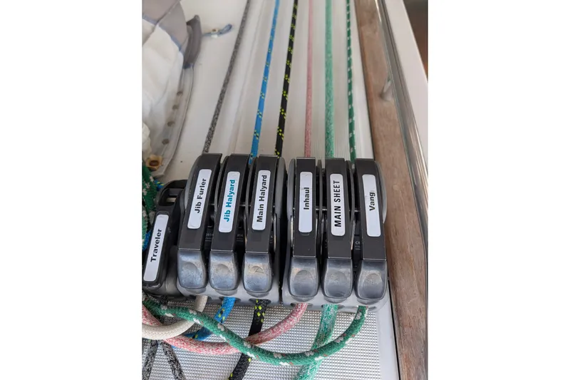 Slide: The Image of Sailing controls on a 2006 Jeanneau Sun Odyssey 45 yacht, labeled for easy navigation. - 18