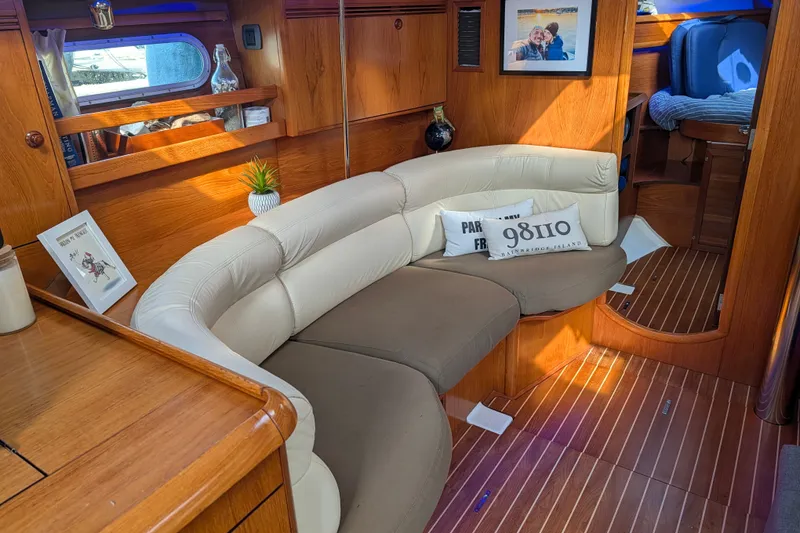 Slide: The Image of Luxurious interior of 2006 Jeanneau Sun Odyssey 45 yacht with cozy seating and elegant decor. - 24