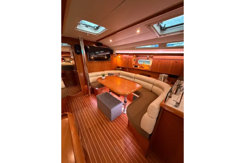 Slide: The Image of Luxurious interior of 2006 Jeanneau Sun Odyssey 45 yacht with elegant wood finish. - 26