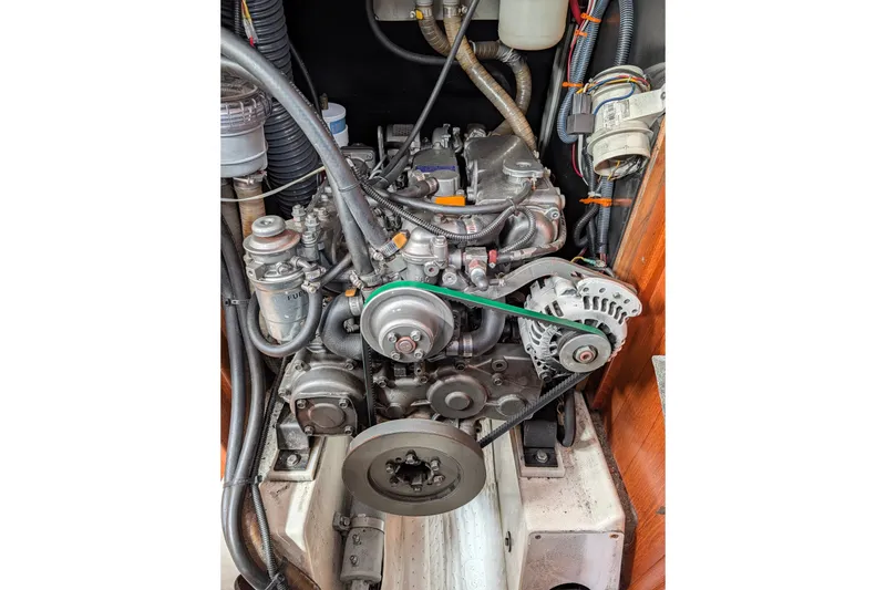 Slide: The Image of Engine of a 2006 Jeanneau Sun Odyssey 45 sailboat, showcasing mechanical components. - 46