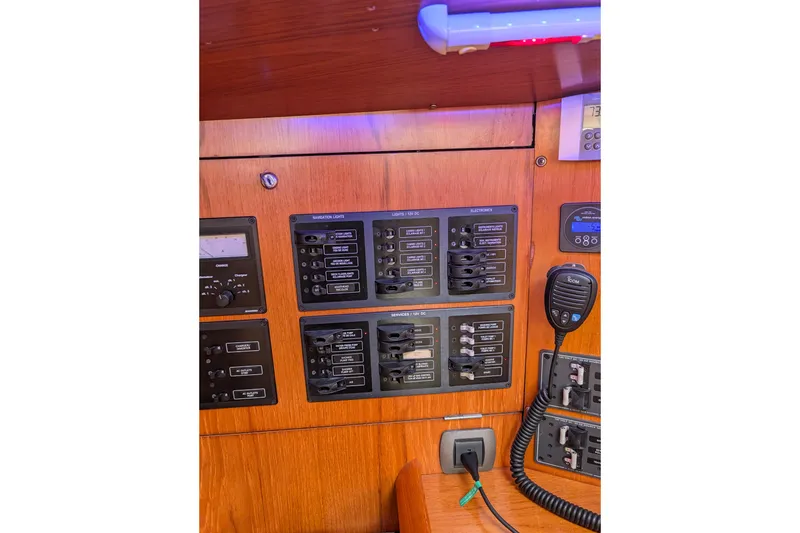 Slide: The Image of Control panel of a 2006 Jeanneau Sun Odyssey 45 sailboat with navigation instruments. - 31