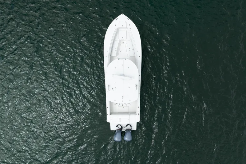 Slide: The Image of Aerial view of 2021 Regulator 28 Forward Seating boat on water. - 11