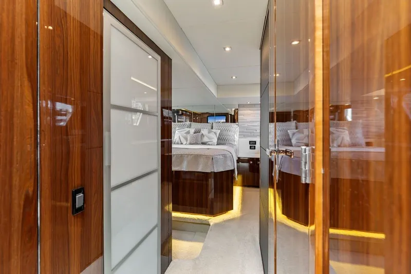 Slide: The Image of Luxurious interior of 2022 Cruisers Yachts 54 Cantius, featuring elegant wood finishes and modern design. - 54