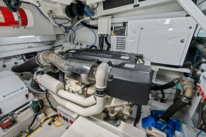 Slide: The Image of Engine room of 2022 Cruisers Yachts 54 Cantius with advanced machinery and equipment. - 76