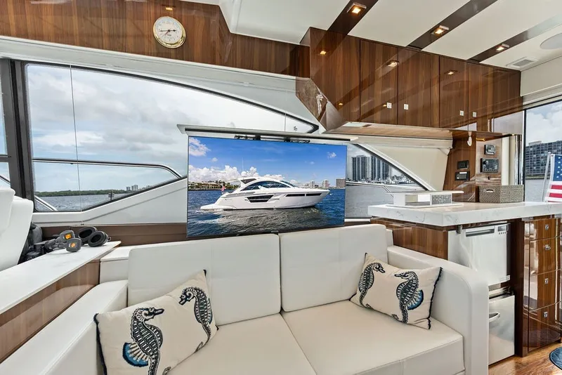 Slide: The Image of Luxurious interior of 2022 Cruisers Yachts 54 Cantius with modern decor and scenic views. - 44