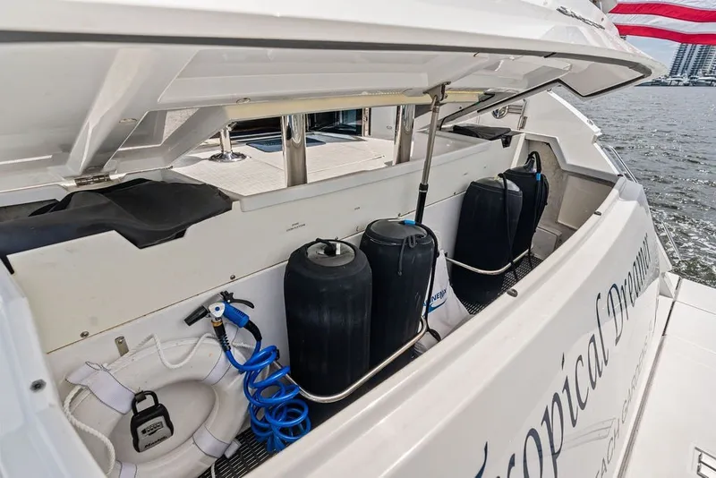 Slide: The Image of Storage compartment on 2022 Cruisers Yachts 54 Cantius, featuring marine equipment and accessories. - 28