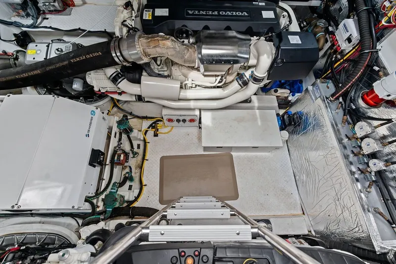 Slide: The Image of Engine room of 2022 Cruisers Yachts 54 Cantius with Volvo Penta engine. - 74