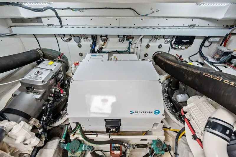Slide: The Image of Engine room of 2022 Cruisers Yachts 54 Cantius with Seakeeper 9 stabilizer. - 78