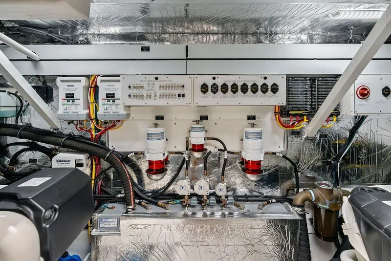 Slide: The Image of Engine room of 2022 Cruisers Yachts 54 Cantius, showcasing electrical systems and components. - 79