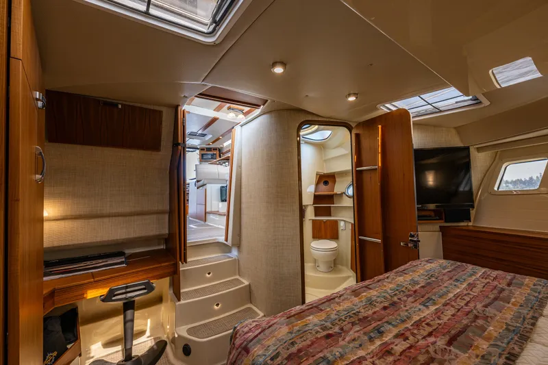 Slide: The Image of Interior of 2020 Ranger Tugs R-41 CB yacht, featuring cozy cabin and modern amenities. - 32