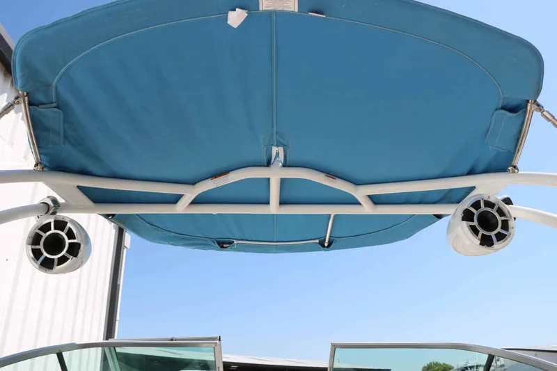 Slide: The Image of View of the blue Bimini top of a Chaparral 23 SSi with speakers. - 39