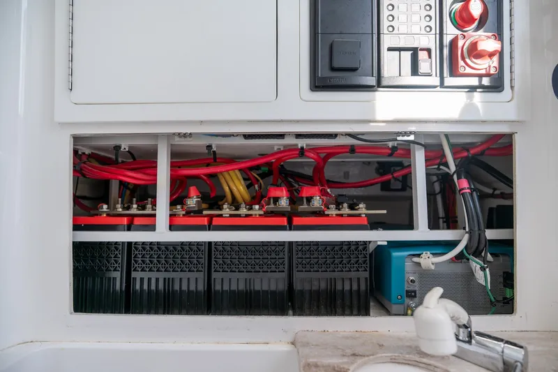 Slide: The Image of Electrical system of 2021 Valhalla V-33 boat, featuring wiring and battery components. - 8
