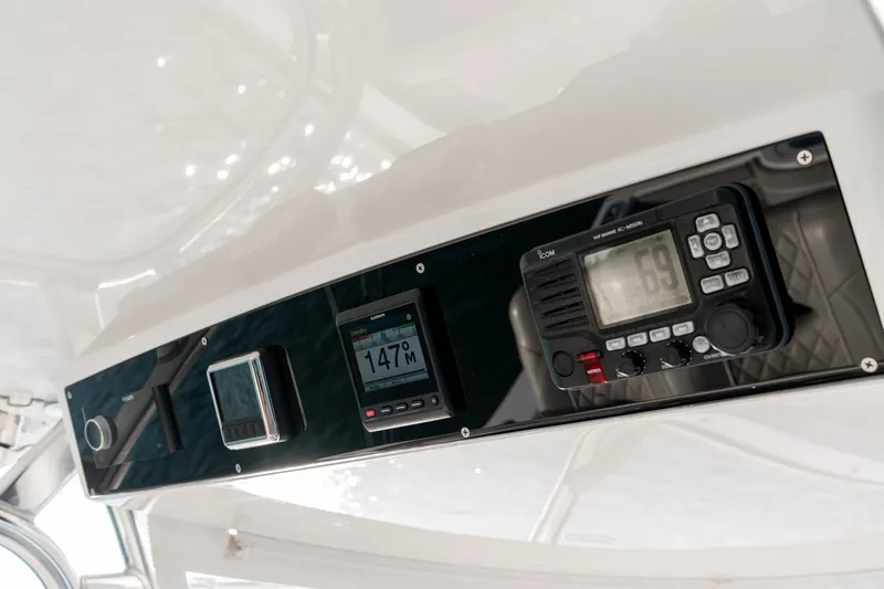 Slide: The Image of Control panel of 2021 Valhalla V-33 boat with navigation instruments. - 23