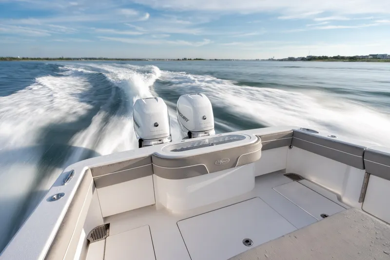 Slide: The Image of Valhalla V-33 boat cruising on water, twin engines, 2021 model. - 10