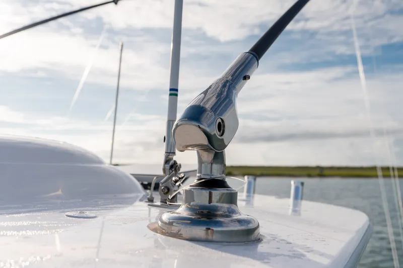 Slide: The Image of Close-up of a 2021 Valhalla V-33 boat deck detail with clear sky background. - 39