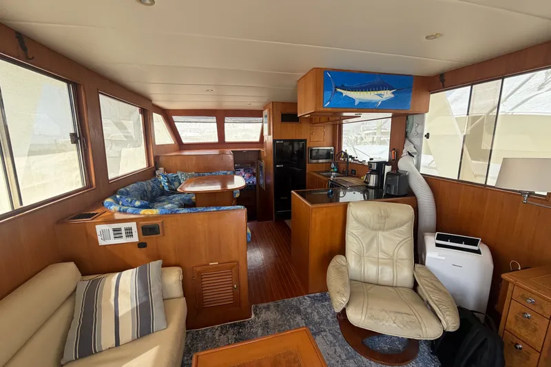 Slide: The Image of Luxurious interior of 2002 Seahorse 45 MY yacht with cozy seating and modern kitchen. - 28