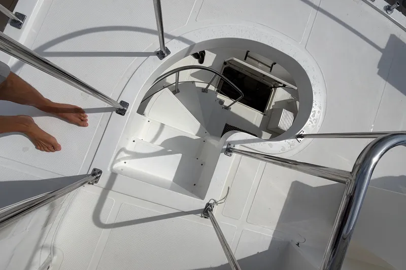 Slide: The Image of Staircase on 2002 Seahorse 45 MY yacht, viewed from above, with metal railings. - 7