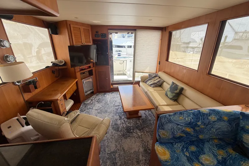Slide: The Image of Luxurious interior of 2002 Seahorse 45 MY yacht with cozy seating and modern amenities. - 24