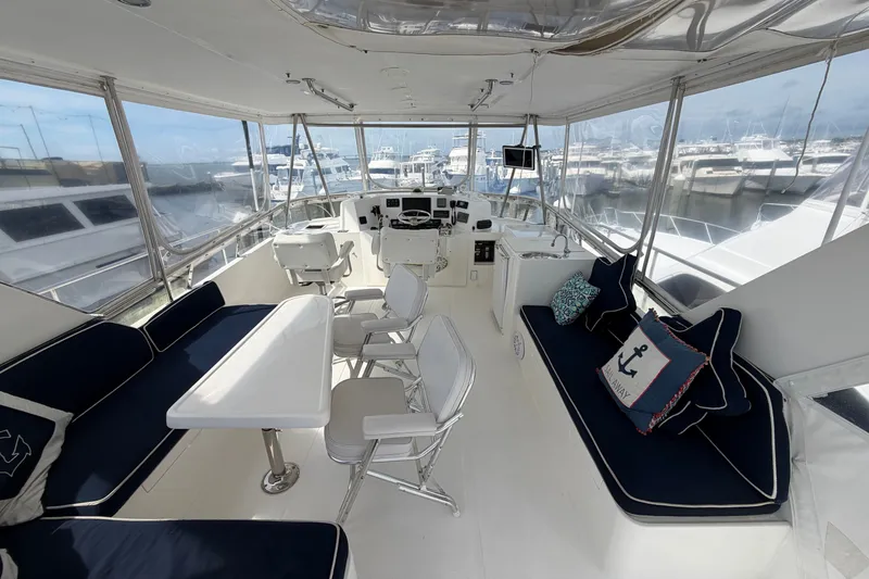 Slide: The Image of Spacious interior of 2002 Seahorse 45 MY yacht with seating and helm station. - 33