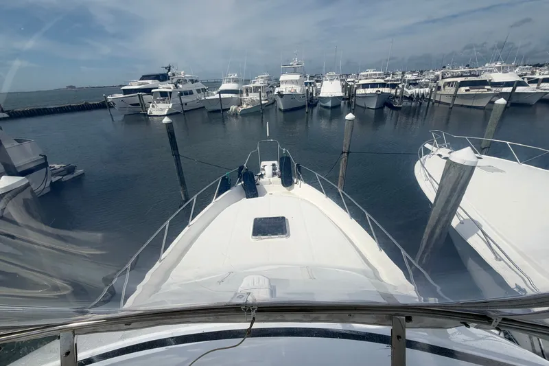 Slide: The Image of Bow view of 2002 Seahorse 45 MY yacht docked in a marina. - 4