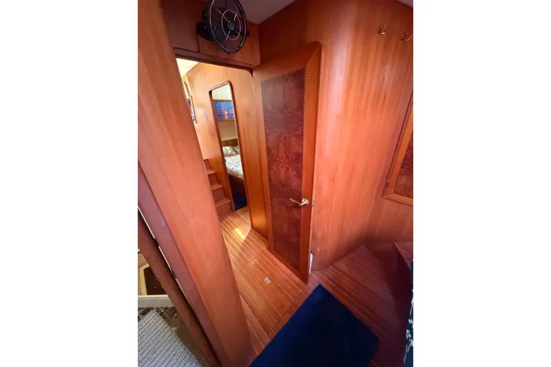 Slide: The Image of Interior of 2002 Seahorse 45 MY yacht with wooden paneling and cozy cabin view. - 31