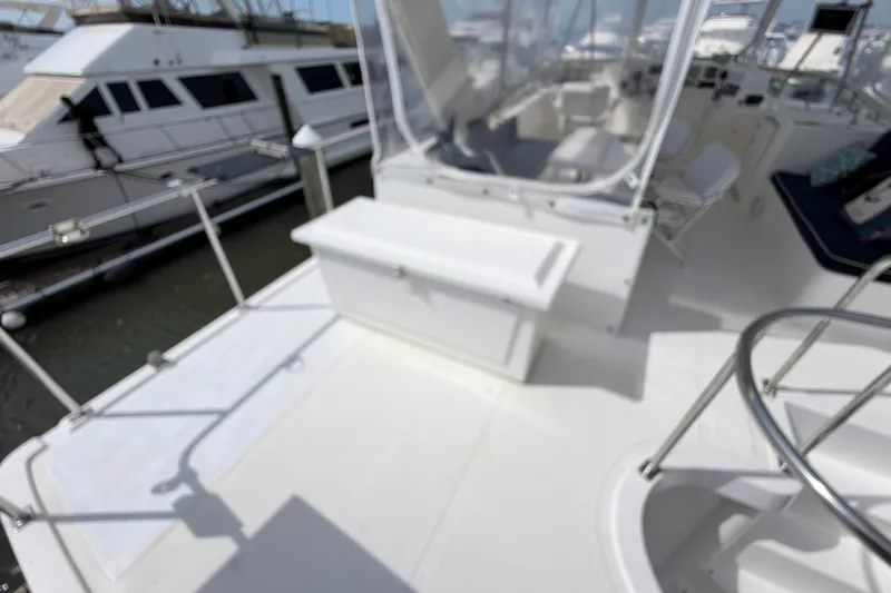 Slide: The Image of Blurry deck view of a 2002 Seahorse 45 MY yacht at a marina. - 5