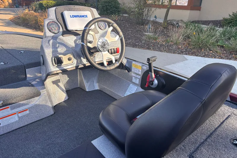 Slide: The Image of Interior of a 2027 Nitro Z17 boat featuring steering wheel and control panel. - 5
