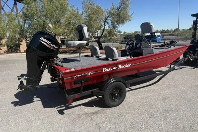 The Image of 2027 Tracker Bass Tracker Classic XL boat with Mercury engine on trailer. - 0