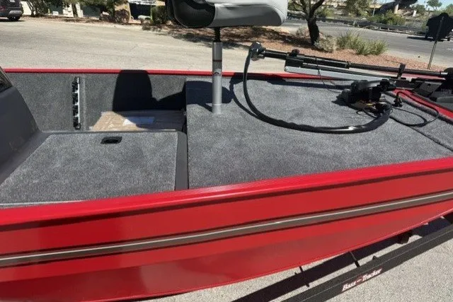 Slide: The Image of 2027 Tracker Bass Tracker Classic XL boat with red exterior and gray interior. - 65