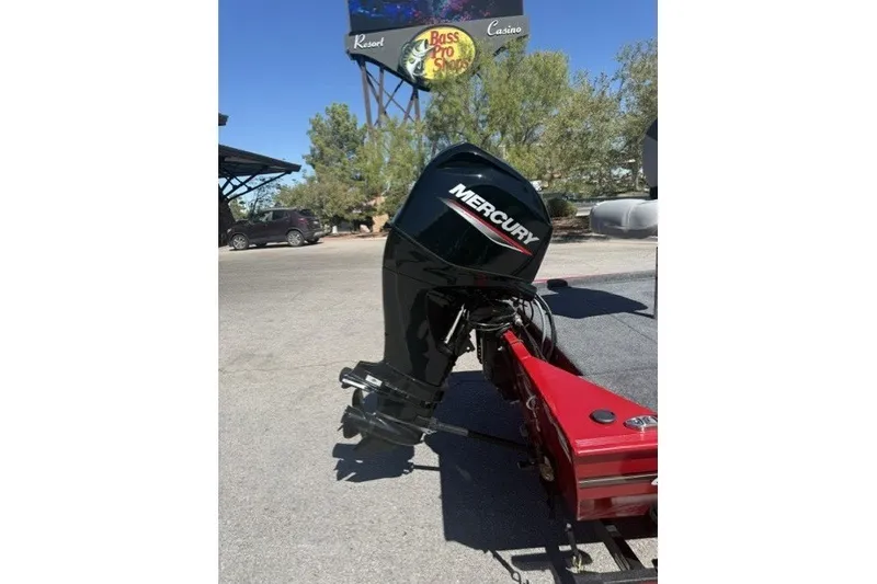 Slide: The Image of 2027 Tracker Bass Tracker Classic XL with Mercury outboard motor in parking lot. - 62