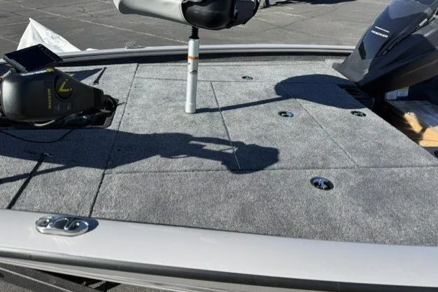 Slide: The Image of 2027 Tracker Pro Team 195 boat deck with fishing equipment and storage compartments. - 37