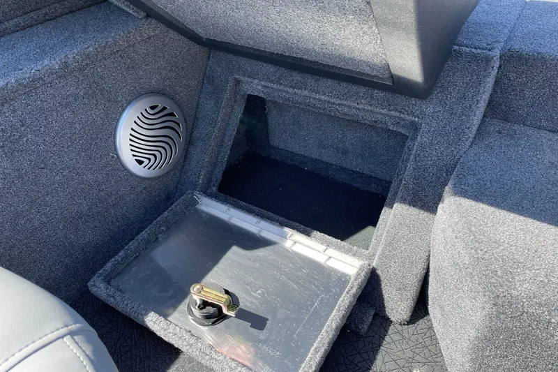 Slide: The Image of Interior of 2027 Tracker Pro Guide V-175 WT boat with speaker and storage compartment. - 21