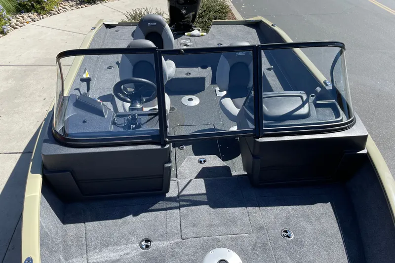 Slide: The Image of 2027 Tracker Pro Guide V-175 WT boat interior with dual consoles and seating. - 25
