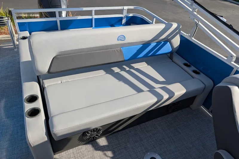 Slide: The Image of Sun Tracker Party Barge 22 RF XP3 2027 interior seating with cup holders and speaker. - 13