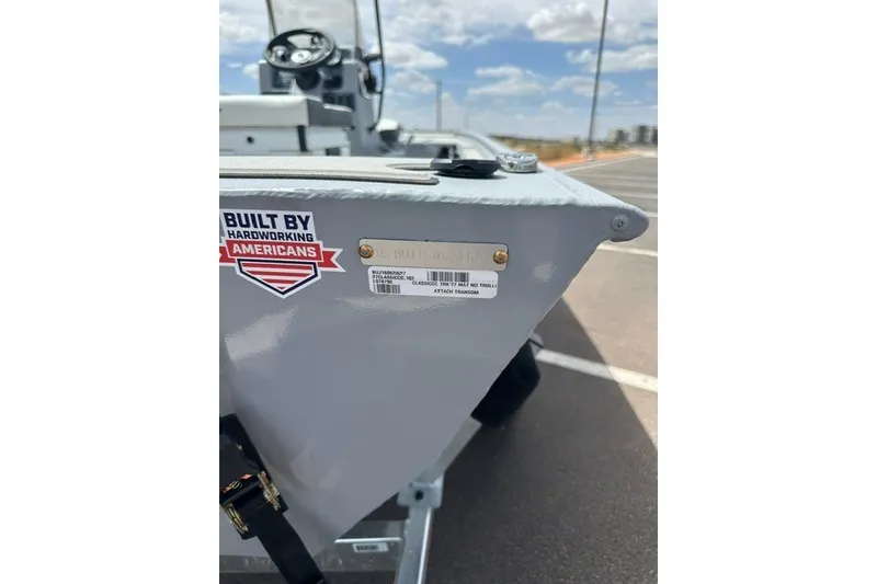 Slide: The Image of 2027 Tracker Bass Tracker Classic CC boat with "Built by Hardworking Americans" sticker. - 14