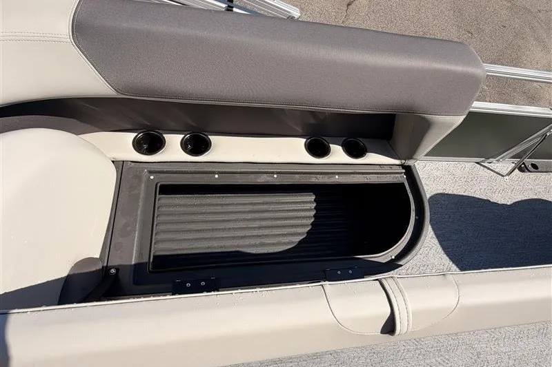 Slide: The Image of 2027 Sun Tracker Bass Buggy 16 XL Select boat seating and storage compartment. - 13