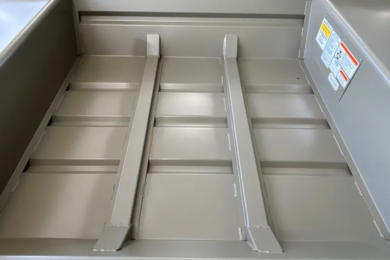 Slide: The Image of Interior view of 2027 Tracker Grizzly 14 Jon boat, showcasing sturdy construction. - 13