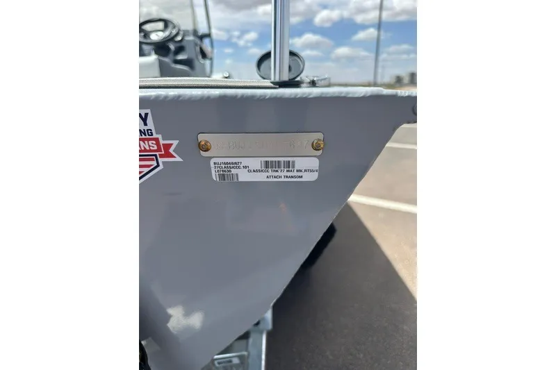 Slide: The Image of 2027 Tracker Bass Tracker Classic CC boat transom with identification plate and barcode. - 19
