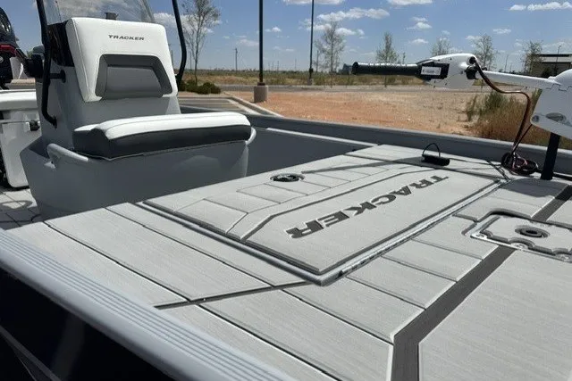 Slide: The Image of 2027 Tracker Bass Tracker Classic CC boat deck with seating and fishing equipment. - 18