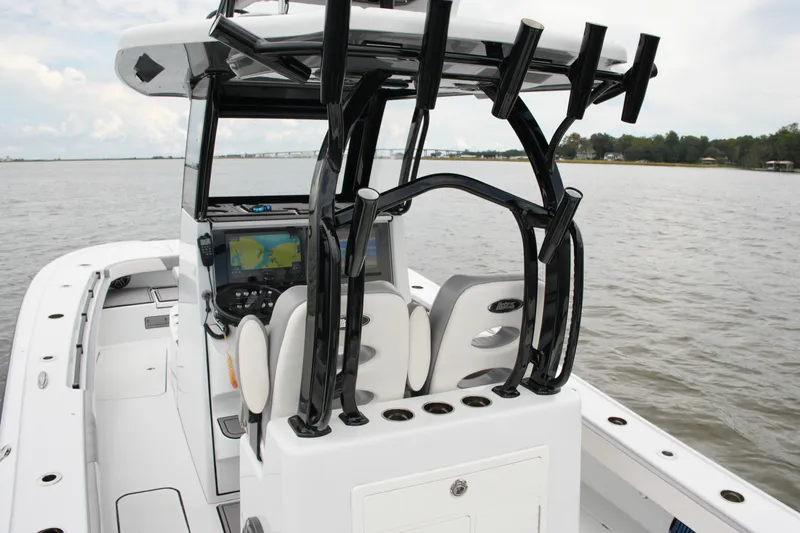 Slide: The Image of 2023 Costa Custom Boats 264 HC on water, featuring advanced navigation and seating. - 50
