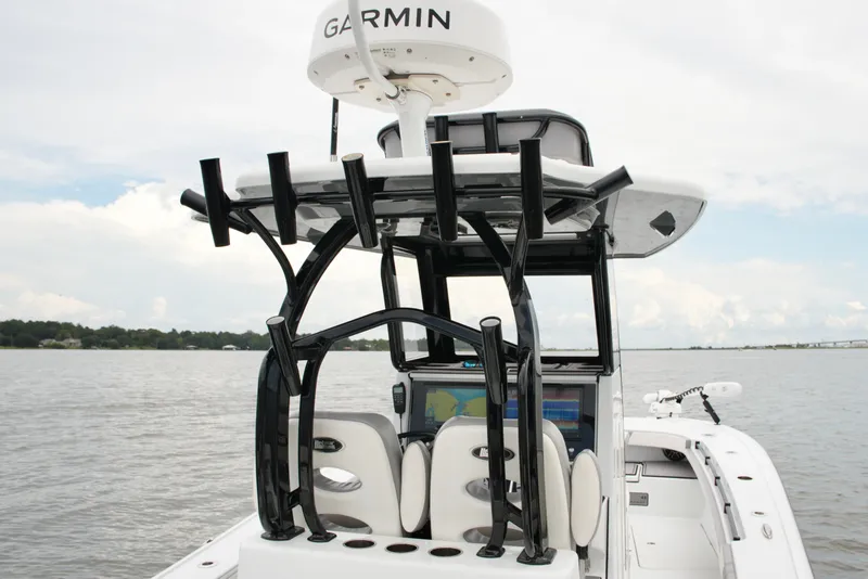 Slide: The Image of 2023 Costa Custom Boats 264 HC with Garmin radar on calm waters. - 48