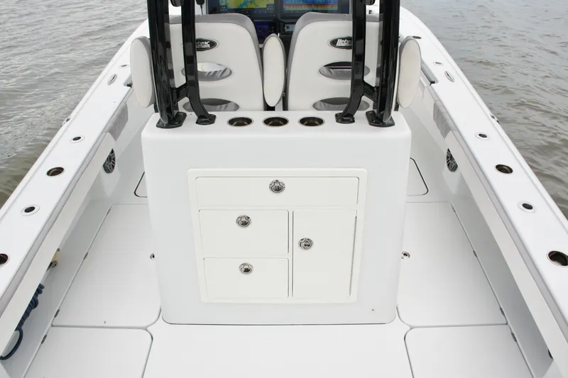 Slide: The Image of 2023 Costa Custom Boats 264 HC deck with storage compartments and seating. - 51