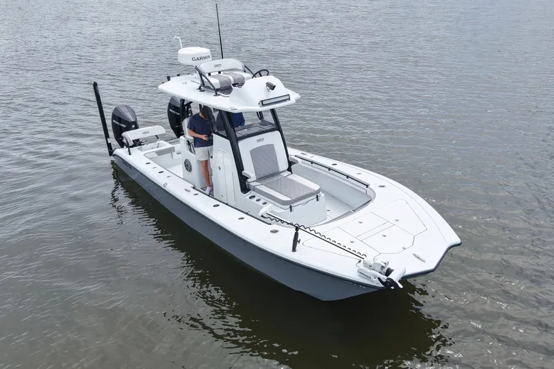 Slide: The Image of 2023 Costa Custom Boats 264 HC on calm water, showcasing sleek design and advanced features. - 27