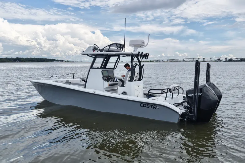 Slide: The Image of 2023 Costa Custom Boats 264 HC on water, featuring sleek design and powerful Mercury engines. - 14