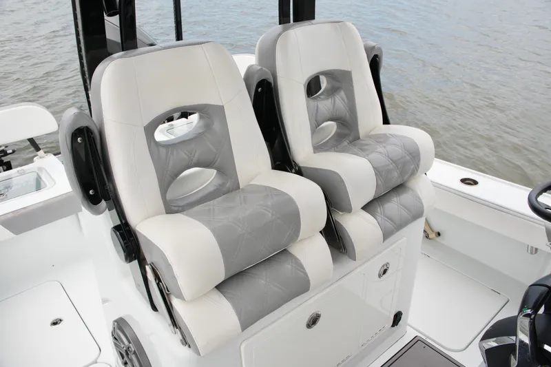 Slide: The Image of 2023 Costa Custom Boats 264 HC interior with luxurious seating on the water. - 42