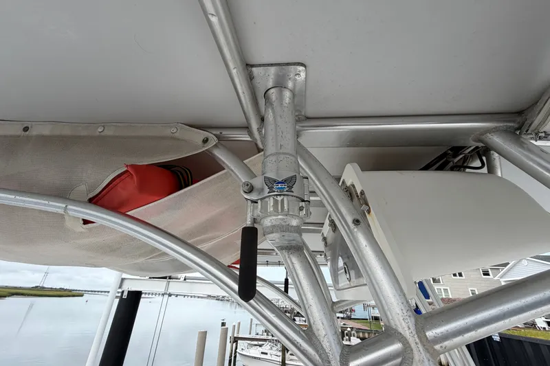 Slide: The Image of 2007 Cape Horn 24OS boat interior with metal framework and storage compartment. - 25