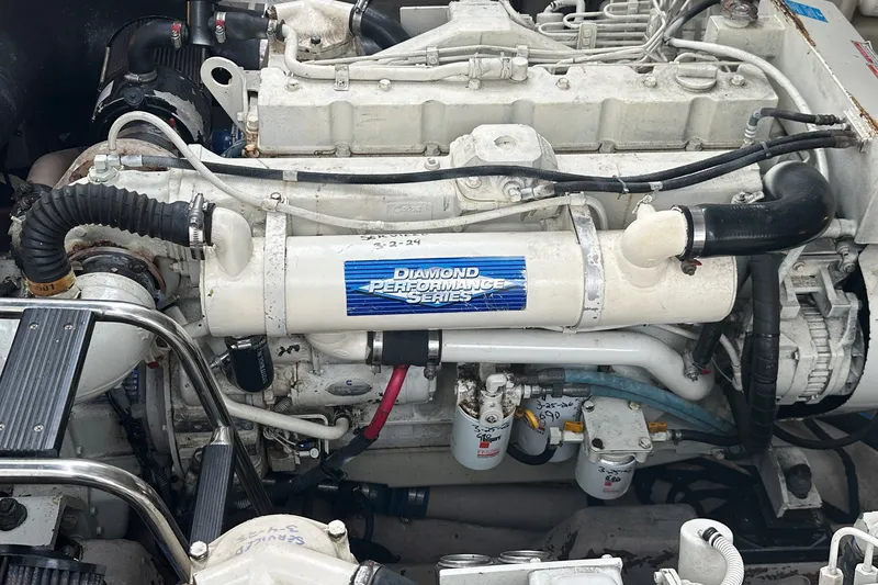 Slide: The Image of Engine of a 2003 Sea Ray 420 Sundancer boat, featuring Diamond Performance Series components. - 29