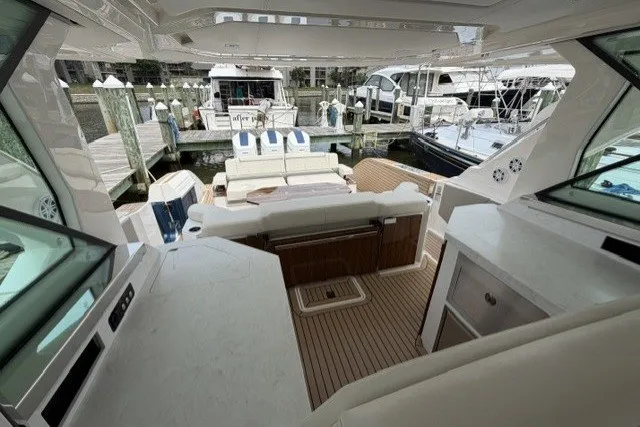 Slide: The Image of Luxurious interior of 2024 Tiara Yachts 48 LS, featuring elegant seating and modern amenities. - 10