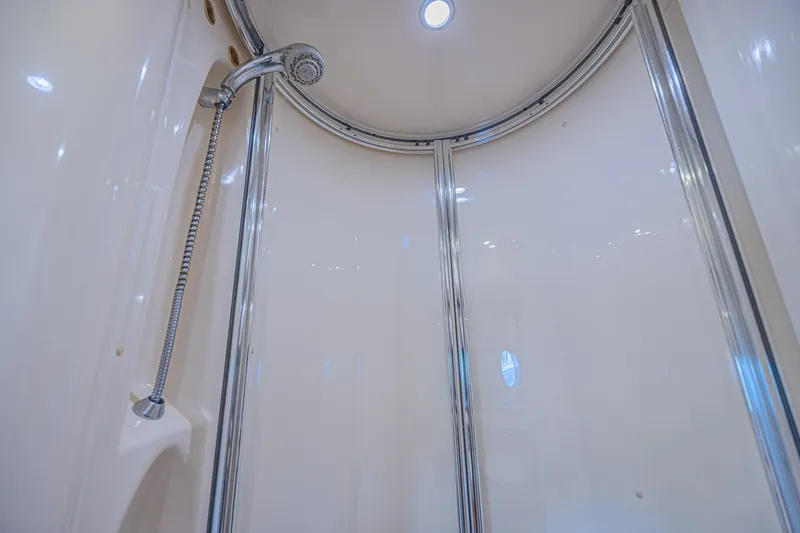 Slide: The Image of Shower area inside 2008 Azimut 62 yacht, featuring sleek chrome fixtures and modern design. - 48